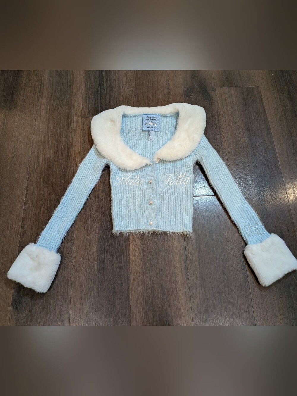 Hello Kitty sz. S faux fur trim baby blue cardigan